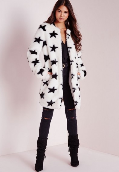 Missguided white faux fur star print coat. Womens coats – winter fashion – warm jackets