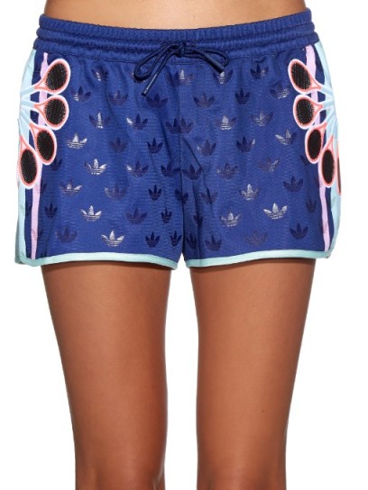 Kylie Jenner style…Adidas X Mary Katrantzou ori logo-print shorts – as worn by Kylie Jenner at her home in Calabasas, October 2015. Celebrity Fashion | star style | what celebrities wear | sports luxe outfits