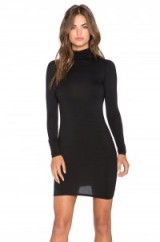 RACHEL PALLY Solange Mini Dress in black with cut out back – as worn by Kendall Jenner out shopping in Beverly Hills, California, 10 December 2015. Celebrity fashion | star style | turtleneck dresses | LBD | what celebrities wear