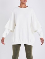 YEEZY Double Sleeve cotton-jersey sweatshirt bleach. White sweatshirts | designer tops