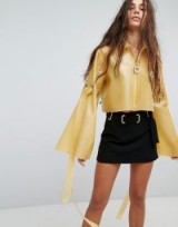 Hanger Latex Jacket With Wide Sleeves / yellow shiny jackets