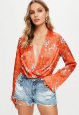 missguided orange wrap front bodysuit / floral bodysuits