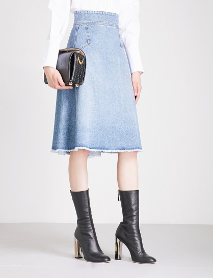 ALEXANDER MCQUEEN Flared denim skirt in Vintage Wash | frayed hem