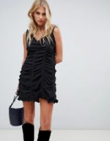 The East Order Paloma ruched mini dress in black | gathered slip dress