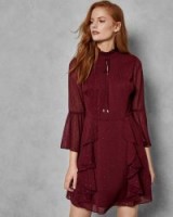 TED BAKER HALEAT Dobby ruffle skirt dress in maroon / high neck, flared sleeve party dresses