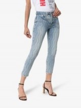 Filles A Papa Crystal Wave-Embellished Twisted Jeans / shimmering denim