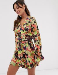 ASOS DESIGN 70s floral print frill hem playsuit / wrap style playsuits