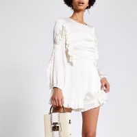 RIVER ISLAND Cream ruffle playsuit – party playsuits