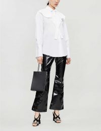 ELLERY Orthodox flared vinyl cotton-blend trousers in black ~ high shine kick-flares