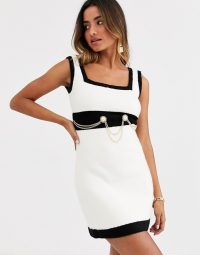 Ronny Kobo anamaree faux pearl micro mini dress with chain belt black / white – glamorous monochrome dresses