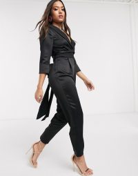 ASOS DESIGN Petite satin wrap tux jumpsuit with peg leg in black | low neckline jumpsuits