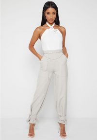 Manière De Voir HALTERNECK JUMPSUIT WITH CHAIN BELT WHITE/STONE