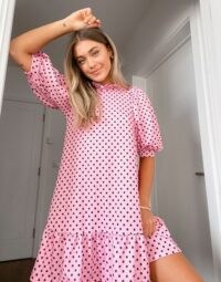 ASOS DESIGN textured mini dress with ruffle neck and puff sleeve in pink with black polka dot | loose fit frill-hem dresses