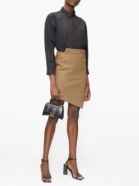 BALENCIAGA Mid-rise asymmetric houndstooth skirt ~ chic angled hem skirts