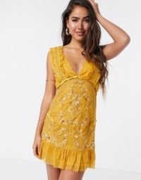 ASOS DESIGN mini dress with eyelet trim and embroidery in mustard | yellow deep plunge front dresses