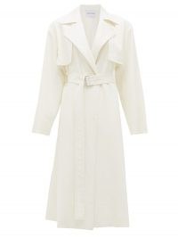 MICHELLE WAUGH The Carina oversized cotton-blend trench coat in ivory white | chic belted coats