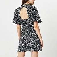 River Island Black puff sleeve floral print mini dress | cut out back volume sleeved dresses