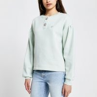 RIVER ISLAND Green ‘RVR’ diamante button sweatshirt ~ drop shoulder sweat top