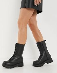 Monki Derek faux leather chunky lace up boot in black ~ calf high combat boots