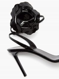 SAINT LAURENT Amber flower-corsage black patent-leather sandals / floral high heels