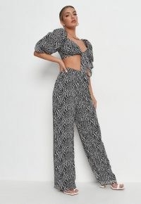 MISSGUIDED black co ord zebra print tie front milkmaid bralet / crop top and trouser summer co ords / animal print fashion sets