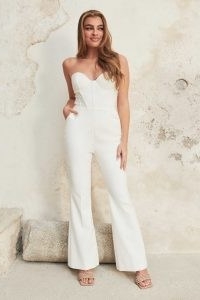 lavish alice bustier corset fit and flare jumpsuit in white | fitted bodice jumpsuits | womens glamorous evening fashion | strapless occasion all-in-one