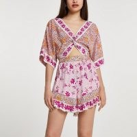 RIVER ISLAND Pink short sleeve floral twist beach playsuit / women’s cut out summer playsuits / beachwear