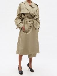 VETEMENTS Human Identity belted cotton-blend trench coat ~ womens designer slogan print coats ~ tie waist outerwear