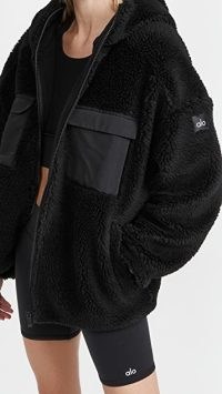 Alo Yoga Cargo Sherpa Jacket in Black – textured sports style jackets