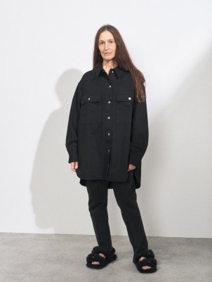 RAEY Oversized black-denim shirt | womens casual curved hem shirts