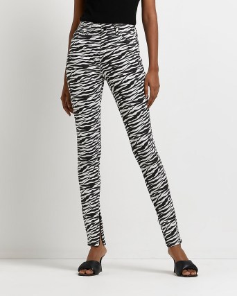 River Island BLACK ZEBRA BUM SCULPT SKINNY JEANS | womens animal print denim skinnies