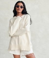 JENNI KAYNE Cotton Boyfriend Sweater in Ivory | women’s oversized dip hem sweaters | relaxed fit side split jumpers | womens luxe knitwear | drop shoulder