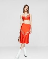 STELLA MCCARTNEY Scribbled Lace Satin Slip Skirt Scarlet Red | luxe semi sheer panel midi skirts | vibrant slinky fluid fabric fashion | women’s feminine clothing made from forest friendly viscose