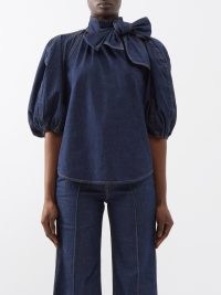 ZIMMERMANN Tie-neck puff-sleeve denim blouse in blue | women’s balloon sleeved blouses | womens designer clothing | pussy bow tops