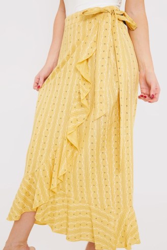 CARYS WHITTAKER YELLOW FLORAL PRINT WRAP MIDAXI SKIRT – frill trim side tie skirts – summer fashion