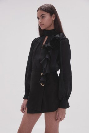 Aje. Aura Frilled Tie Blouse in Black ~ chic high neck side ruffled blouses ~ feminine top with ruffle and cut out details