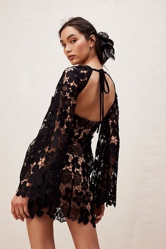 Free People Remi Mini Dress in Black / semi sheer floral wide sleeve dresses / open back with tie detail