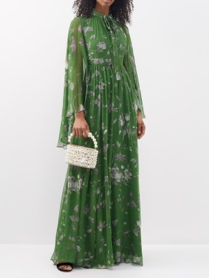 ERDEM Tie-neck floral-print silk gown in green – flowing sheer overlay cape gowns – romantic occasion maxi dresses – floaty and feminine long drop sleeve event dress