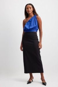 NA-KD Mid Waist Midi Skirt in Black | stretchy back slit pencil skirts | wardrobe essentials