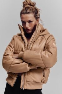 alo yoga FAUX LEATHER BOSS PUFFER in TOASTED ALMOND – oversized padded jackets – women’s fashionable winter outerwear