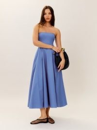 Reformation Astoria Dress in Dusk – blue strapless fit and flare midi dresses – bandeau neckline – organic cotton summer fashion – tulle lined full skirt