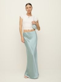 Reformation x Laura Harrier Lakisha Skirt in Aquamarine – light blue silk maxi slip skirts