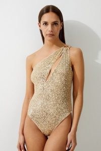 KAREN MILLEN Sequin Cut Out Asymmetric Thong Swimsuit in Gold / glittering sequinned swimsuits / glamorous asymmetric swimwear