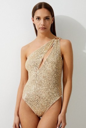 KAREN MILLEN Sequin Cut Out Asymmetric Thong Swimsuit in Gold / glittering sequinned swimsuits / glamorous asymmetric swimwear