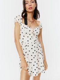Reformation Pacey Dress in Sweetheart – white heart print dresses