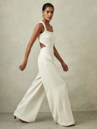 REISS DION TWILL OPEN-BACK WIDE LEG JUMPSUIT in IVORY – off white sleeveless cut out back jumpsuits