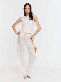 Reformation Olina Pant in White Eyelet / women’s floral semi sheer relaxed fit summer trousers