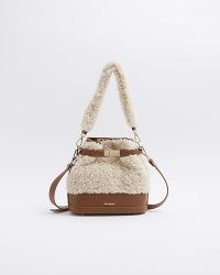 RIVER ISLAND Beige borg bucket cross body bag / faux shearling grab handle bags