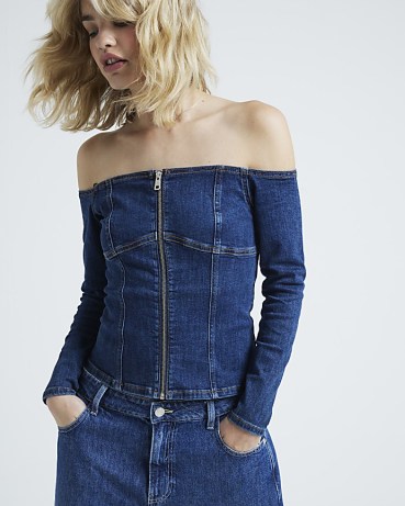 River Island Blue denim bardot zip up top | fitted long sleeve off the shoulder tops | womens trendy fashion | blonde beach wave long bob