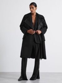 REISS Atelier Matilda Felted Trapeze Coat in Black ~ women’s chic flared hem coats